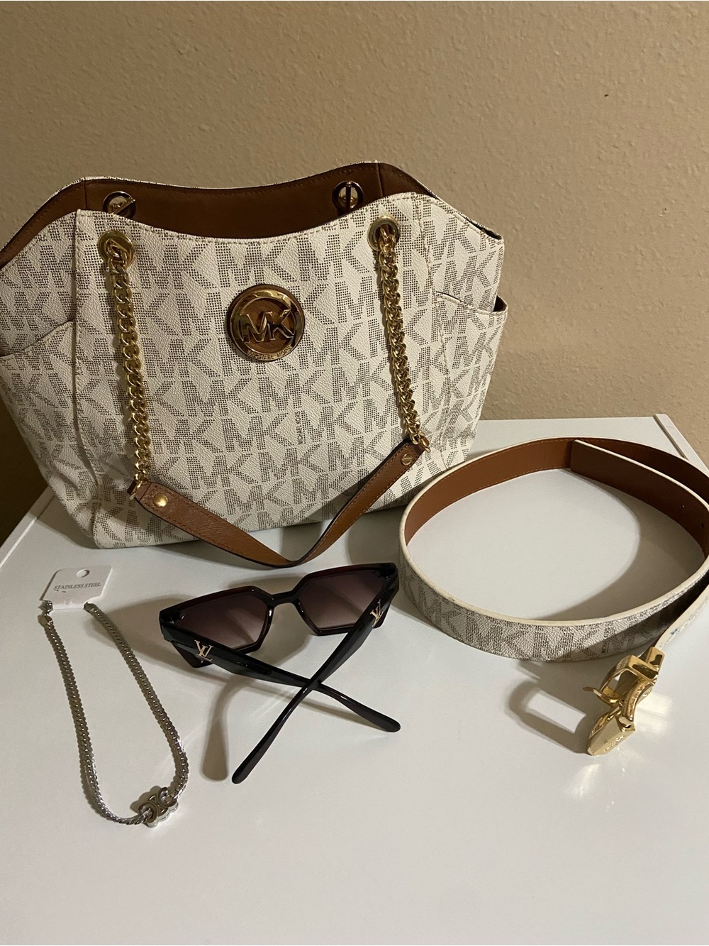 MK handbag, MK belt, beautiful LV sunglasses and necklace